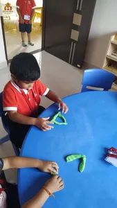 Table activity-Making triangle shape using play dough
