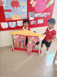 Blocks/ toys creating school in classroom-7