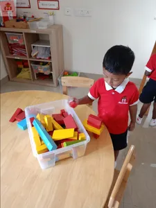 Blocks/ toys creating school in classroom-8
