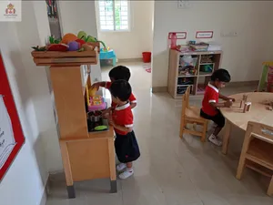 Blocks/ toys creating school in classroom-13